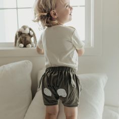 It can’t get Bunnier than these bloomers! Coming in beautiful gender-neutral colors and features a fun bunny friend on the backside. An adorable short made of soft organic fabric for comfort and coverage for those sweet little bottoms. GOTS Certified Baby Wear- The leading industry standard for organic textiles by Kudaa. 95% Organic Knit Cotton, 5% Elastane Washing instructions: Machine Wash and Dry Low Heat Bayleaf color Cute Bottoms With Built-in Shorts For Playwear, Cute Short Diaper Cover For Playtime, Playful Short Diaper Cover For Playwear, White Playful Bloomers For Playtime, Playful White Bloomers For Playtime, Playful Cotton Short Bottoms, Playful Cotton Shorts, Playful Cotton Shorts For Loungewear, Playful Cotton Bottoms With Built-in Shorts