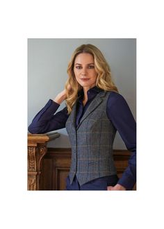 Tailored Winter Vest For Office, Tailored Office Vest For Winter, Fall Vest With Notch Lapel And Button Closure, Tailored Single-breasted Tweed Vest, Classic Vest With Lapel Collar For Fall, Fall Notch Lapel Vest, Winter Workwear Single-breasted Vest, Fall Tweed Single-breasted Vest, Single Breasted Tweed Vest For Workwear