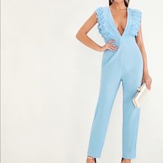 Stretchy High Waisted Ruffles Back Zip Closure 95% Polyester, 5% Spandex Imported Size S M L Bust 31” 32” 35” Waist 28” 29” 32” Hips 40” 41” 43” Length 54” 55” 57” Fitted V-neck Jumpsuit With Ruffles, V-neck Ruffled Jumpsuit For Date Night, Ruffled V-neck Jumpsuit For Date Night, Blue V-neck Jumpsuit With Ruffles, Elegant Blue Jumpsuits And Rompers With Ruffles, Fitted Jumpsuits And Rompers With Ruffles And V-neck, Fitted Ruffle Jumpsuits And Rompers, Fitted Ruffles Jumpsuit Overalls, Fitted Ruffle Jumpsuits And Rompers For Work