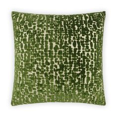 a green and white pillow on a white background