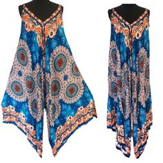 This Beautiful Sapphire Blue Peacock Feather And Mandala Print Sleeveless Jumper Is A Gorgeous New Addition To Our Spring/ Summer Collection. Jumpers Are A Great Summery Look And Great For Day Or Evening! Dress It Up With A Belt And Heels For A Fabulous Evening Look. A Romantic Look With Flats Or Sandals For A Day On The Beach Or At The Park. Jumpers Are A Very Favorite Style Of Women Of All Ages Because Of The Ease Of Having A Complete Outfit With On Item. These Jumpers Fit All Frames But Are G Blue Bohemian Jumpsuits And Rompers For Spring, Sleeveless Printed Blue Jumpsuits And Rompers, Blue Bohemian Jumpsuit For Spring, Blue Printed V-neck Jumpsuits And Rompers, Blue Bohemian Printed Jumpsuits And Rompers, Blue Printed Jumpsuits And Rompers For Beach, Blue Printed Jumpsuits And Rompers For Summer, Blue V-neck Jumpsuit For Beachwear, Sleeveless Blue Jumpsuits And Rompers For Beachwear