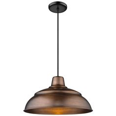 an industrial style pendant light fixture with a bronze finish on the bottom and black metal accents