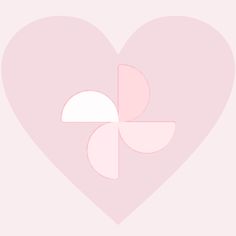 a pink heart with an image of a flower in the middle