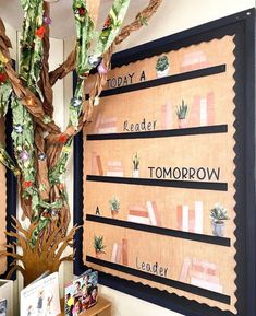 a bulletin board with words on it in front of a tree and bookshelf