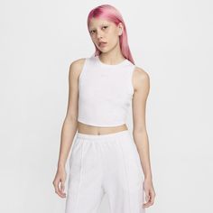 Grounded in style, comfort and versatility, meet our new luxury loungewear. With a cropped fit that hits near the waist, this tank is made from our soft mini-ribbed jersey is stretchy with a slight drape, making it perfect for everyday wear. So wear it around the clock and all through the calendar. Fitted Sportswear Crop Top For Spring, Sporty Cotton Crop Top With Medium Support, Nike Spring Activewear With Relaxed Fit, Nike Relaxed Fit Activewear For Spring, Nike Relaxed Fit Spring Activewear, Trendy Cropped Tank Top For Loungewear, Cropped Cotton Sports Bra For Workout, Fitted Tops For Leisure In Spring, Fitted Tops For Spring Leisure