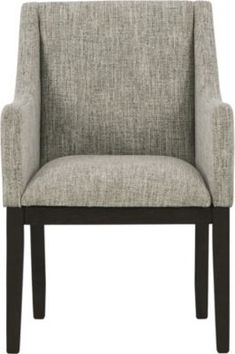 a gray chair with dark wood legs