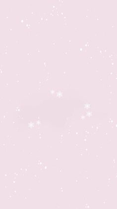 a pink background with white snow flakes