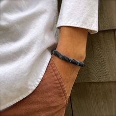 MENS BLUE BRACELET: This hand-knotted macrame rope bracelet includes two genuine Hematite stones and a Rumi Sumaq logo bead. In a striking color combination of blue and gray, it is a great bracelet for men. Purchase two or more as a symbol of solidarity with your brother, father or best friends. It is the modern version of friendship bracelets. SIZING of ROPE BRACELET: The bracelet goes on over your hand like a bangle but is size adjustable with a sliding knot closure. That means there is some f Ankle Bracelets Boho, Rope Bracelet Men, Sliding Knot Closure, Cotton Bracelet, Awareness Bracelet, Hematite Stone, Bracelet Men, Bracelet Blue, Sliding Knot