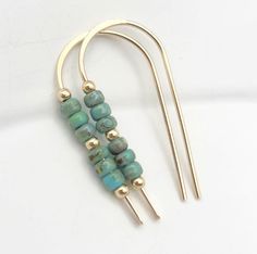 Handmade Gold & Turquoise Beaded Threader Earrings. Add a touch of luxurious sparkle to your look with these elegant gold & turquoise seed bead earrings! Lightweight miyuki seed beads are threaded on a gold chain, giving them a graceful dangle. Be the envy of all your friends with these stunning statement earrings! * 14k Gold Filled * Measure approximately 1.25 Inches * Quality Turquoise colored Miyuki Seed Beads * Sent in a Ribboned Gift Box * Handmade in Montana ----- OUR MATERIALS -----  *STE Turquoise Round Bead Earrings For Everyday, Everyday Turquoise Round Bead Earrings, Everyday Turquoise Beaded Earrings, Turquoise Earrings Gold, Gift Box Handmade, Rings Ideas, Box Handmade, Earrings Turquoise, Fall Earrings