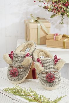 Toasty toes and a ready smile – these adorable slippers are merry-comfortable. Acrylic sweater knit uppers have a pompom nose and plaid antlers. Reindeer Slippers, Acrylic Sweater, Shop Gifts, Coldwater Creek, Family Holiday, Sweater Knit, Antlers, Home Gifts, Reindeer