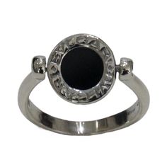 Reversible two-sided ring Size: 6.75 Luxury Onyx Rings For Formal Occasions, Modern White Gold Enamel Ring, Luxury Silver Rings For Evening, Luxury Black Enamel Signet Ring, Black Engraved Ring With Polished Finish For Formal Occasions, Luxury Hallmarked Onyx Rings, Formal Black Engraved Ring With Polished Finish, Formal Polished Enamel Ring, Classic Black Enamel Round Ring