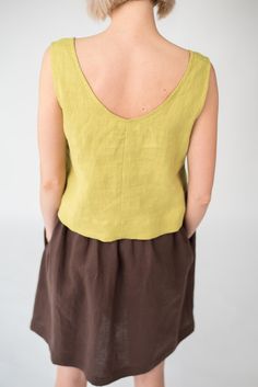 "Relaxed fit sleeveless linen crop top with wide V-neck creates a romantic and careless look. Because of its versatility suitable in many combinations and for various occassions. Something that doesn't require time or effort to make you look stylish and subtly seductive. DETAILS - Relaxed fit - Fits true to size - can be made shorter or longer depending on your preference - Wide V neckline - Sleeveless - 100% midweight 185 g/m2 European softened linen fabric - Oeko Tex certified linen - Various Relaxed Fit Scoop Neck Crop Top For Summer, Spring Relaxed Fit Crop Top Tank Top, Sleeveless Linen Crop Top For Spring, Summer Cropped Linen Tank Top, Summer Cropped Linen Tops, Cropped Linen Top For Summer, Linen Summer Crop Top Tank Top, Summer Linen Tops With Scoop Neck, Summer Linen Crop Top Tank