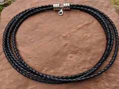 Four strands of 4mm braided black leather is a great compliment to of my pendants or as is. Rhodium lobster clasp has an outside diameter of 14mm. 18"in length. Braided Leather Necklace, Black Braids, Braided Leather, Leather Necklace, Multi Strand, Lobster Clasp, Chain Necklace, Braids, Black Leather