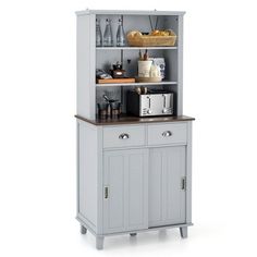 a kitchen cabinet with an open door and shelves