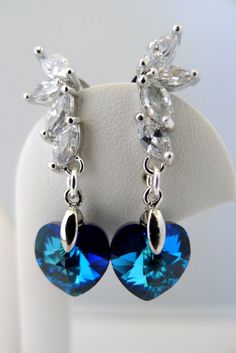 Peacock Wedding Earrings, Bermuda Blue Swarovski Crystal Earrings, Navy Blue Heart Earring, Bridesma Elegant Blue Earrings For Valentine's Day, Elegant Blue Heart Earrings For Anniversary, Blue Elegant Heart Earrings For Pierced Ears, Crystal Heart Earrings For Wedding, Elegant Blue Heart Earrings For Pierced Ears, Elegant Blue Heart Drop Earrings, Elegant Blue Heart Cut Earrings, Blue Earrings For Valentine's Day Party, Heart-shaped Cubic Zirconia Crystal Earrings For Wedding