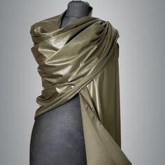 "A very elegant \"leather look \" extra soft shawl for your wedding party or evening dress. Made of luxury looking fabric, slightly sparkles on the sun or light, the inside is soft and comfortable z Color: khaki green ( other colors are available ) Size : 200 cm x 50 cm approx You can use it as a wrap, shawl or stola. WE have matching satin bags in Etsy Shop! WE accept credit cards!" Elegant Gold Shawl For Winter, Evening Shawl Wrap Scarf, Winter Evening Shawl Scarf, Evening Shawl Wrap, Elegant Green Shawl For Fall, Elegant Green Shawl For Party, Elegant Winter Party Shawl, Elegant Green Fall Shawl, Elegant Winter Wrap