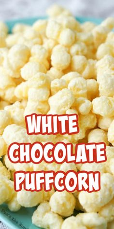 white chocolate popcorn on a blue plate with the words white chocolate puffcorn above it