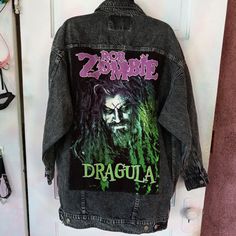 Custom Made Ooak Upcycled Hand-Crafted Rage Against The Sewing Machine Jacket! This One-Of-A-Kind Designed Jacket Is So Rad! Created In The Casual Horror Goth Aesthetic, This Nwt Distressed Deep Grey Denim Jacket Really Pops & Stands Out With The Hand-Crafted Hand-Stitched Rob Zombie Dragula Bat Out Of Hell Fandom Xxxl Homemade One-Of-A-Kind Back Patch W Dope Green Stitching & Lootgaming Offical Skull Gothic Pin! All Rage Custom Creations Are Made By Hand With Hours Of Hand-Stitching, Creating C Crust Jacket, Grey Denim Jacket, Rob Zombie, Distressed Jacket, Tripp Nyc, Custom Patches, Diy Clothing, Goth Aesthetic, Grey Denim