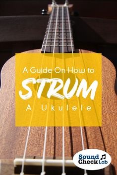 an ukulele with the words, a guide on how to strum aukle