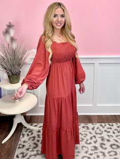 Introducing the stunning puff long sleeve smocked tiered maxi dress in ROSE BRICK! This must-have dress embodies elegance and grace with its airy puff sleeves and flowy tiered design. Perfect for any occasion, it's a versatile and comfortable addition to your wardrobe. Don't miss out on this beautiful dress! Fabric Contents:• 100% Polyester Brunch Maxi Dress With Smocked Cuffs, Tiered Maxi Dress With Gathered Sleeves, Flowy Tiered Maxi Dress With Gathered Sleeves, Flowy Maxi Dress With Smocked Cuffs For Brunch, Tiered Maxi Dress For Fall Brunch, Fall Tiered Maxi Dress For Brunch, Modest Ruched Maxi Dress For Brunch, Billowy Maxi Dress For Fall Brunch, Bohemian Maxi Dress With Gathered Sleeves For Brunch