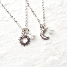 Sun and Moon necklace set. A silver plated sun and moon charm is accompanied by a natural crystal quartz bead. Hung on Sterling Silver chain.Chains pictured are 18 and 25 inches (45.7 and 63.5cm).Sun, moon and star charms measure 1/2 inch tall (12mm).Also available in gold: https://etsy.me/3e1RudZMore Best Friends necklaces: http://etsy.me/29jm5WK>>>Packaging<<>>Shipping Policy<<>>Good Vibes Refund Policy<<>>Repairs<<>>For International Cu Matching Sun And Moon Jewelry, Handmade Spiritual Necklaces For Best Friend Gift, Handmade Spiritual Necklace For Best Friend, Handmade Adjustable Charm Necklaces For Best Friend, Minimalist Moon Phase Jewelry For Healing, Bohemian Sterling Silver Charm Necklace, Spiritual Silver Charm Necklaces With Moon Phase, Spiritual Silver Charm Necklace With Moon Phase, Silver Spiritual Moon Charm Necklace