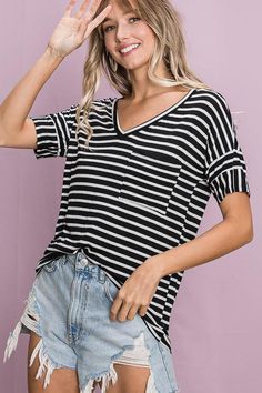 Born to Make You Happy is a Black & White Striped Top that has a V Neck and a front pocket. The top is lightweight and perfect for warm weather. The top looks great paired with jeans, shorts, and a bracelet set. Summer V-neck Top With Pockets, V-neck Tops With Pockets For Vacation, Casual T-shirt With Side Pockets For Summer, V-neck Top With Pockets For Day Out, Black Beach Tops With Pockets, Casual Beach Tops With Pockets, Black Summer Tops With Pockets, Vacation Tops With Pockets And V-neck, Black Short Sleeve Summer Top