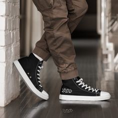 Step up your style game with our custom-designed men's high top sneakers! Handcrafted with premium materials, these high tops offer unmatched comfort and durability. Express your unique personality with our range of eye-catching designs, from classic to contemporary. Each pair is meticulously crafted to ensure a perfect fit and exceptional quality. Whether you're into streetwear or casual chic, our high tops will elevate any outfit. Explore our collection now and stand out from the crowd with th Camo Men, White High Tops, Mens Canvas Shoes, Trans Pride, Cap White, Mens High Tops, Unique Shoes, Unisex Shoes, Us Man