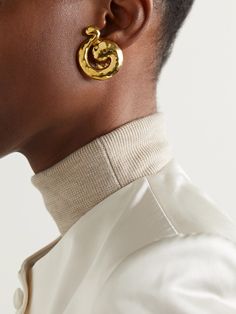 Susan Caplan grew up in a family of antique curators, which helped develop her keen eye for detail and rare jewelry from a young age. These gold-plated Yves Saint Laurent earrings are cast in sculptural swirls and hammered to give them a subtle textured surface. The clip fastenings make them easy to wear, pierced ears or not. Saint Laurent Earrings, Vintage Yves Saint Laurent, Rare Jewelry, Jewelry Pins, Roger Vivier, Bow Clips, Clip Earrings, Gold Texture, Ulla Johnson