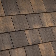 a brown roof with wooden shingles on it