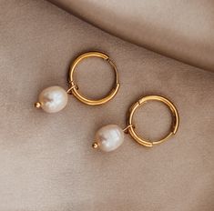 --LosAngelesMinimalist-- Drop Dangle Pearl Earring, 18K Gold Filled Hoops, Wedding Jewelry, Bridesmaid Gifts, Bridal Shower Gift, Anniversary Gift, Pearl Jewelry With non tarnish and waterproof material usage, the fresh water pearl earrings will be your favorite jewelry for everyday wear. The earring comes as pairs. If you want to personalize the earrings, please write your personalization request to the personalization box with font number from font chart. Note: Personalization will be applied Font Chart, Font Number, Gold Filled Hoops, Jewelry Bridesmaid, Pearl Earring, Pearl Earrings Dangle, Bridal Party Gifts, Bridal Shower Gifts, Jewelry Earrings Hoops