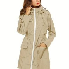 Item Type : model Brand Name : MINISO Recommend Age : 18+ Origin : Mainland China Size: L.  Color: Beige.  Age Group: adult. Windproof Solid Color Parka For Fall, Nylon Raincoat With Pockets For Rainy Season, Parka With Detachable Hood For Rainy Weather, Utility Nylon Raincoat For Fall, Fall Windbreaker With Detachable Hood For Rainy Weather, Utility Parka For Rainy Weather In Fall, Utility Parka For Fall And Rainy Weather, Solid Parka With Double-lined Hood For Rainy Weather, Fall Utility Parka For Rainy Weather