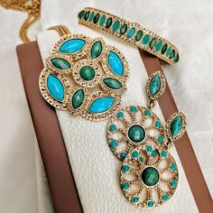 This stylish 28" 14K Gold Dipped necklace features a unique pendant adorned with green and aqua blue stones. It will be your handcrafted classic go-to accessory for years to come. Its a timeless pendant necklace and an affordable gift for her. Measurements: 28"L x 1.9"W x 1.9"H 1928 JEWELRY COLLECTION From the vaults of rich European capitals to the antique laden attics of old American estates, 1928 Jewelry has created modern replicas of the most beautiful, exquisite vintage jewelry ever made. F Channel Jewelry, Blue Pendant Necklace, Chic Fashionista, Large Pendant Necklace, 1928 Jewelry, Vintage Inspired Jewelry, Open Hoop Earrings, Blue Stones, Blue Pendant