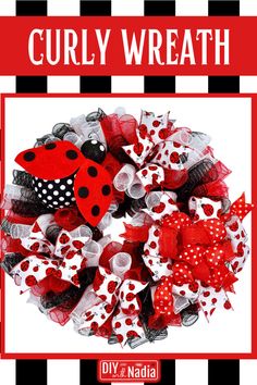 a red and white wreath with ladybug decorations on the front, says curlywreath