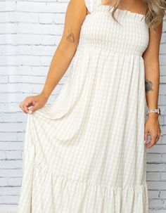 Get your boho-chic on with our Mel Dress! This playful maxi features a smocked top for a perfect fit, while the plaid print and ruffled hem add a touch of whimsy. Perfect for any occasion, this dress will have you feeling stylish and comfortable. 100% Polyester Smocked Top, Shoe Gifts, Romper Dress, Plaid Print, Skirt Leggings, Dress Romper, Cardigan Jacket, Short Tops, Denim Pants