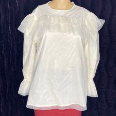 Ruffled Tulle Blouse Long Sleeve Ivory Color Size M #480 The Package Includes: 1 Blouse (Not The Skirt) Please Look At The Pictures The Pictures Are Not Professional Pictures Please See Listed Pictures For Full Details. Sold As Is. Comes As Is With What You See Pictures. What You See In The Picture Is What You Will Get. Feminine Off White Party Top, Feminine Off White Top For Party, Feminine Off-white Party Top, Long Sleeve Cream Blouse For Wedding, Chic Off White Tops For Wedding, Chic Off-white Tops For Wedding, Chic Off-white Wedding Tops, White Sheer Sleeve Tops For Wedding, White Sheer Sleeves Top For Wedding