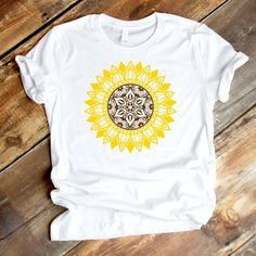 a t - shirt with an image of a sunflower on it