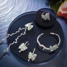 This gorgeous Jade Butterfly Necklace offers a stunning combination of natural beauty and classic elegance. Hand-crafted with translucent jade, it features a delicate butterfly pendant that makes it the perfect accessory for any occasion. With its stunning luster and inimitable craftsmanship, this is an exclusive piece of jewelry that will add timeless sophistication to any look. DETAILS Materials: Brass,   Platinum, Cubic Zirconia   Measurements: Length: 17.83"(45.3cm) + Extender: 1.97"(5.0cm) Bracelet For Wedding, Wedding Affordable, Jade Butterfly, Women Nature, Diamond Star Necklace, Luxury Details, Star And Moon Necklace, Butterfly Motif, Cat Pendant Necklace