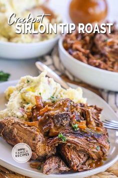 a close up of a plate of food with meat and mashed potatoes on the side