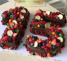 the number 50 is made out of fruit and chocolate