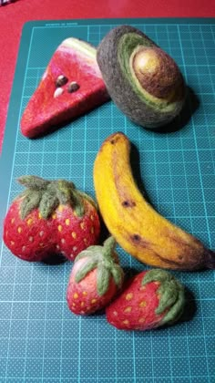 some fruit are laying on a cutting board