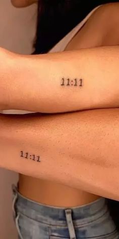 two women with tattoos on their arms and the words i love you written in cursive font