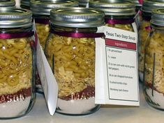 several jars filled with macaroni and cheese