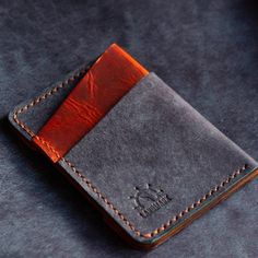 This unique wallet contains 1 quick access slot on the back, and the interior hold up to 10 cards and cash folded in half. The front pocket slots hold an additional 2-6 cards.  * Made from Full Grain Badalassi Carlo Leather * Hand Stitched with Ritza or Maine Thread * Holds 7-12 Cards and Cash * "Lifetime" Warranty   "Lifetime" is in quotes because well, I can't guarantee anything beyond the point I venture into... well, the beyond. I stand by all of my products and will do whatever I can to make repairs or replacements in the event of defects. Occasionally thread or hardware just doesn't hold up, and I'll happily replace those. The leather will last forever unless you leave it outside for weeks or wash it - and even then it can usually be resurrected.  Handmade in Nevada, United States. H Rfid Blocking Bifold Card Holder, Black Bifold Card Holder For Personal Use, Everyday Use Trifold Card Holder With Card Slots, Trifold Card Holder With Card Slots For Daily Use, Black Trifold Wallet With Card Slots, Bifold Card Holder With Card Slots, Leather Card Holder With Card Slots, Leather Card Holder With Slots, Bifold Card Holder With Slots For Everyday Use