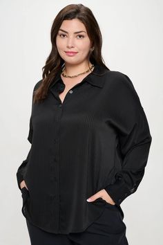 Stay stylish and comfortable in our Plus Size Pinstripe Collared Button Down. With long sleeves and a collared neckline, this button down is perfect for any occasion. Add a touch of sophistication to your wardrobe with this classic pinstripe design. Look and feel your best with this must-have piece! Product Details: COLLARED LONG SLEEVES BUTTON DOWN BUTTON CUFF DETAIL DROP SHOULDER STRIPE PATTERN SATIN TEXTURE WOVEN TOP 100%POLYESTER Pinstripe Blouse With Striped Collar And Long Sleeves, Chic Pinstripe Collared Blouse, Chic Pinstripe Collared Shirt, Elegant Pinstripe Tops With Button Closure, Black Long Sleeve Blouse With Striped Collar, Classic Pinstripe Button-up Shirt, Black Button-up Top With Placket, Elegant Pinstripe Button-up Blouse, Black Button-up Shirt With Concealed Placket