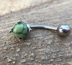 - Material: 316L Surgical Steel - Gauge (Thickness): 14 Gauge - Length: 10mm bar - Quantity: One piece Naval Jewelry, Belly Piercing Jewelry Boho, Dark Green Belly Button Piercing, Adjustable Green Belly Rings As Gift, Belly Button Rings Emerald, Teal Belly Button Piercing, Belly Button Piercing Hippy