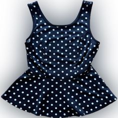 Nwt Forever 21 Polka Dot Peplum Top -New With Tags -Size: Small -Peplum Top Style (Flared Out Detail At The Bottom Of Shirt) -Color: Black, White Polka Dots -98% Polyester -2 % Spandex Very Stretchy! Fitted Polka Dot Sleeveless Top, Forever 21 Tops, White Polka Dot, Peplum Top, Polka Dot, Top Styles, Forever 21, Colorful Shirts, Polka Dots