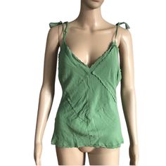 Dona Karan New York Top Green Color V Neckline Sleeveless Self Tie Spaghetti Straps. Patchwork Size 8 (Worn On A Size 2 Mannequin) Measurements Laying Flat Chest 17" Length 19"(Straps Not Included) No Returns No Holds No Trades Green Sleeveless Camisole With Straps, Green Tank Top With Straps For Beach, Spring Sleeveless Camisole With Tie Straps, Green Tank Top For The Beach, Fitted Camisole With Tie Straps For The Beach, Green Cami Top With Adjustable Straps, Green Tank Strap Camisole For Spring, Spring V-neck Tank Top With Straps, Green V-neck Summer Camisole