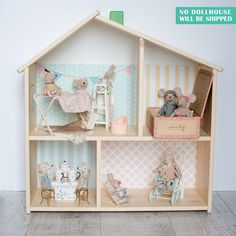 a doll house with many toys in it