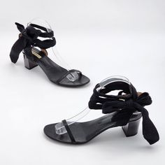 Dries Van Noten Wrap Around Ankle Tie Sandals In Black Size 37.5 It // 7 Us. Excellent Used Condition. Please See All Photos. Beautiful Black Leather With Thick Fabric Ribbon Wraps. Heel Strap Is Embellished With Beautiful Details. Block Heel; Approx 2". Simple And Classic Style. Made In Italy. Spring, Summer, Fall, Flats, Sandal, Shoe, Everyday Shoes, Minimalist, Simplistic, All Black, Vintage, Hard To Find, Htf, Rare, Sold Out, Unique, Y2k, Casual, Work, School, Vacation, Classic, Chic, Cute, Stylish, Designer, Saks, Nyc, Gifts For Her, Holiday Gifts. Comes From A Smoke-Free, Pet-Free Home. Formal Low Heel Lace-up Sandals With Wrapped Heel, Formal Lace-up Sandals With Wrapped Low Heel, Evening Lace-up Sandals With Wrapped Low Heel, Evening Lace-up Sandals With Low Heel, Leather Low Heel Lace-up Sandals For Evening, Leather Lace-up Low Heel Sandals For Evening, Evening Lace-up Sandals With Stacked Heel, Evening Lace-up Open Toe Sandals With Stacked Heel, Formal Ankle Strap Lace-up Sandals With Removable Insole