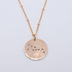 What's your sign? These sweet handmade zodiac necklaces are written in the stars, literally. Strung on a 18 inch chain in the metal of your choice, this coin has tiny dot zodiac star cut outs. Simply select your sign and we'll send you the stars. Need one for a friend? Take a peek at all twelve! 3/4”L Coin on a 18” Chain. Rose Gold Zodiac Sign Round Pendant Necklace, Rose Gold Zodiac Round Pendant Necklace, Rose Gold Zodiac Sign Necklace As Gift, Rose Gold Zodiac Sign Necklace For Gift, Nickel-free Rose Gold Round Charm Necklaces, Nickel-free Round Rose Gold Charm Necklaces, Nickel-free Round Pendant Charm Necklace In Rose Gold, Rose Gold Zodiac Sign Jewelry For Gift, Dainty Zodiac Sign Round Necklace